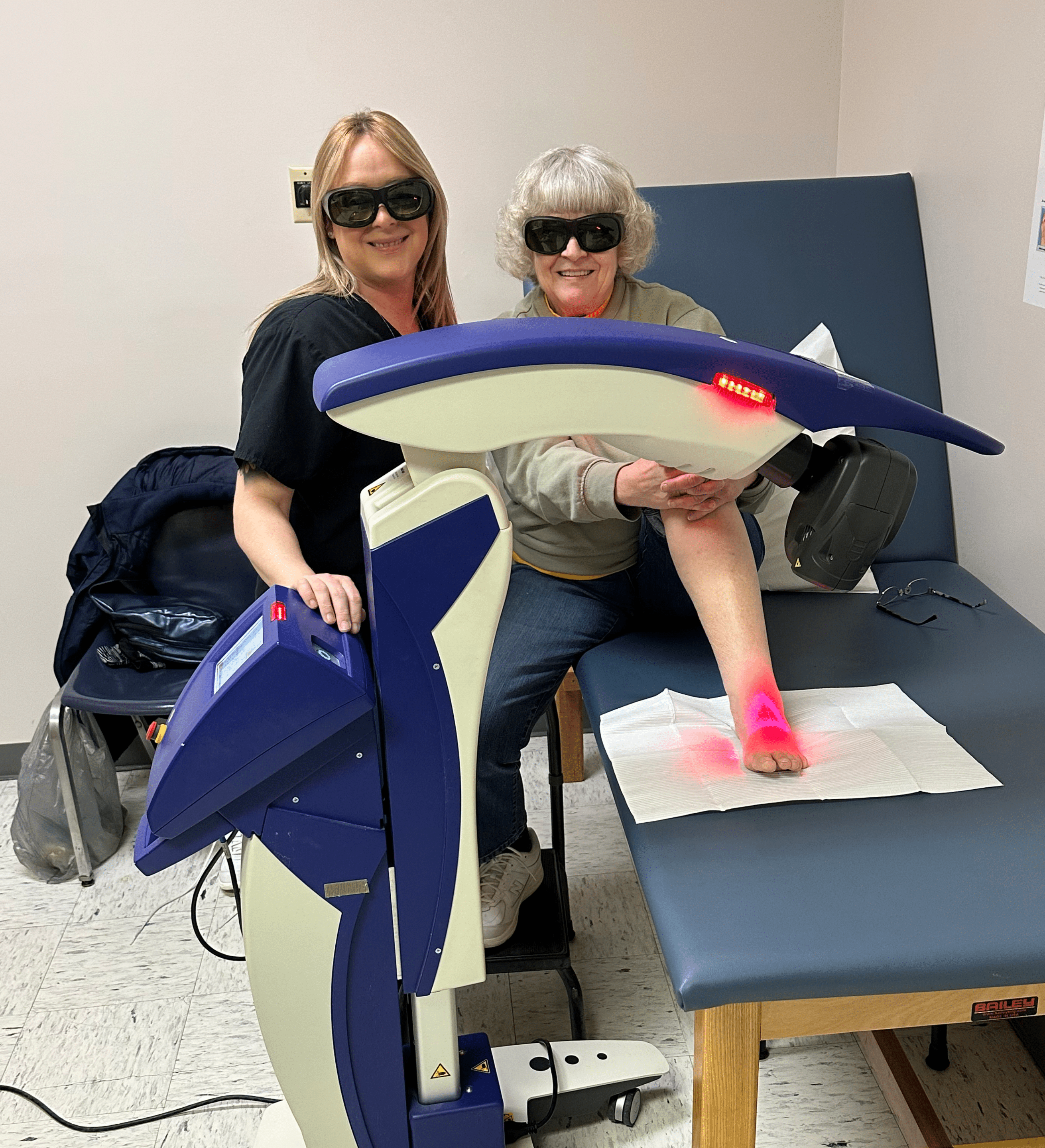 doctor and patient using mls therapy for heel pain